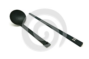 Black spoon and chopsticks isolated