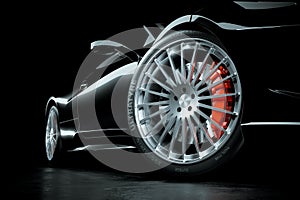 Black sports car, close up wheel brakes in studio light 3D
