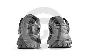 Black sports women`s running shoes. Close up. Isolated on white background
