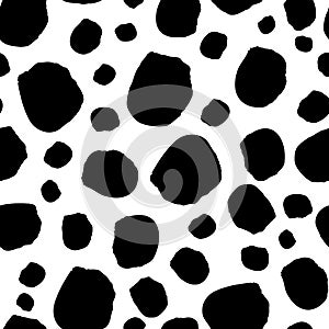 Black spots on white background seamless vector pattern. Abstract background with round brush strokes. Monochrome hand