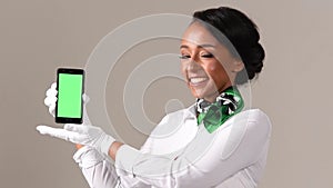 Black stewardess on gray background