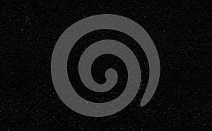 Black stone background with microcracks