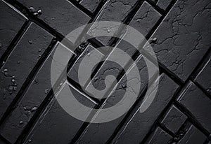 Black stone cement floor. Close up of black tiles made from bricks.