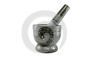 Black stone mortar and pestle isolated on white background