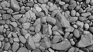 Black stone, Shiny black lava pebbles on the beach