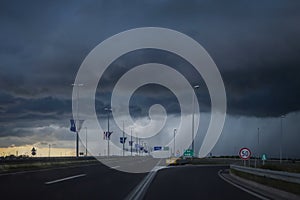Black storm clouds above highway