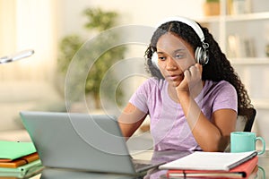 Black student e-learning online at home