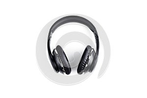 Black stylish professional wireless headphone on white background. High-quality music studio headset.