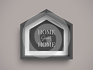 Black stylish wooden frame in shape of house with inscription Home Sweet Home