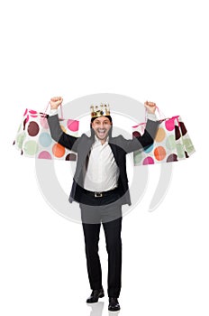 The black suit man holding plastic bags isolated on white