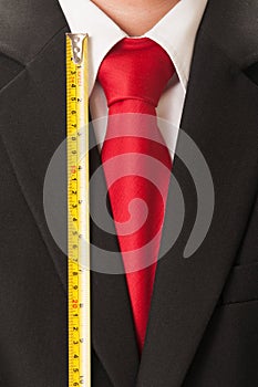 Black suit, red tie, white shirt and centimeter