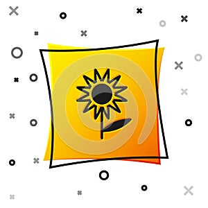 Black Sunflower icon isolated on white background. Yellow square button. Vector