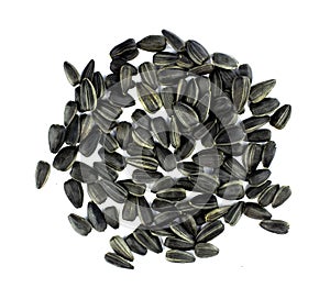 Black sunflower seeds isolated over white background