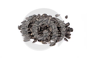 Black sunflower seeds on white background