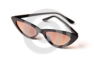 Black sunglasses with brown glasses isolated on a white background