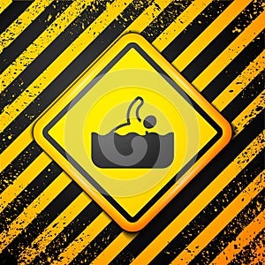 Black Swimmer athlete icon isolated on yellow background. Warning sign. Vector