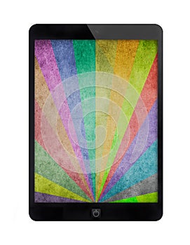 Black tablet with multicolor sunbeams grunge background.