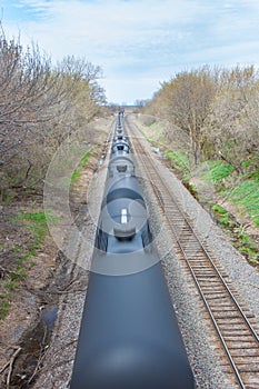 Black Tank Cars in Motion