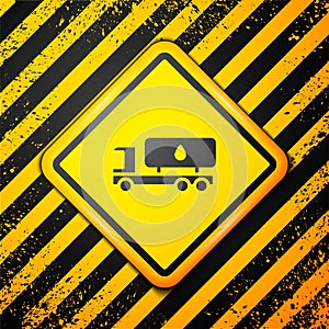 Black Tanker truck icon isolated on yellow background. Petroleum tanker, petrol truck, cistern, oil trailer. Warning sign. Vector
