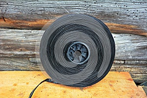 Black tape hose for watering plants with drip system