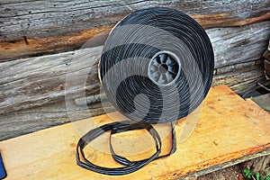 Black tape hose for watering plants with drip system