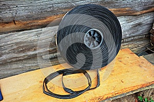 Black tape hose for watering plants with drip system