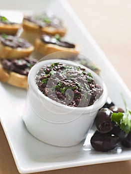 Black Tapenade on Toasts