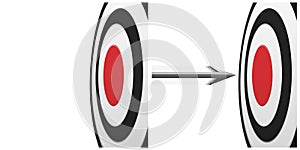 Black target with red center and flying arrow