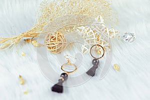 Black tassel metal earrings;Earrings are handmade;With dried bouquets and decorations of various shapes.