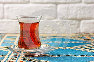 Black tea in armudu glass