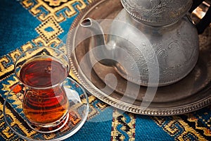 Black tea in armudu glass