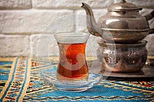 Black tea in armudu glass