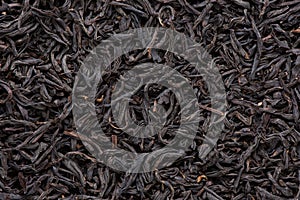 Black tea leaf background texture