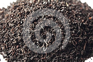 Black tea loose dried tea leaves macro