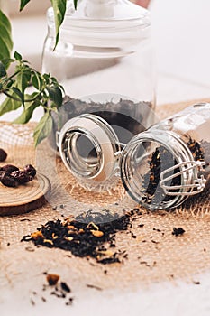 Black tea with natural additives in a glass jar