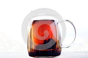 Black tea and teapot