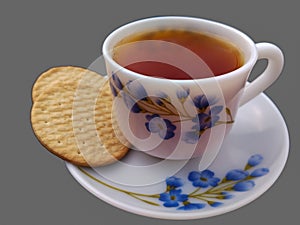 Black tea with two biscuits