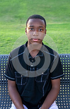 Black Teen Boy Looks Serious