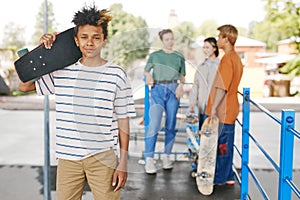 Black Teenage Boy with Skateboard