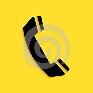 Black Telephone handset icon isolated on yellow background. Phone sign. Call support center symbol. Communication