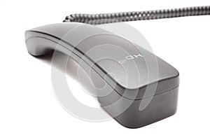 Black telephone receiver with cable