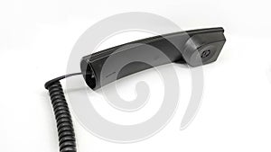 Black telephone receiver cord isolated with white background