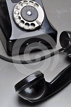 Black telephone with rotary dial