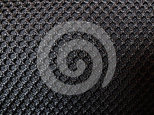 Black textile furniture upholstery mesh. Background textured seamless pattern