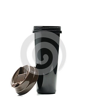 Black thermos bottle with open lid on white background