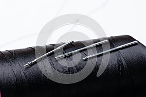 Black thread and industrial needle