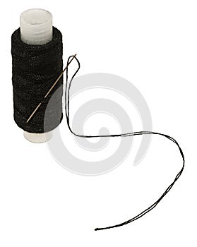 Black thread reel with a needle