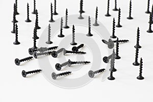 Black threaded screws isolated on a white background