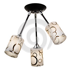 Black three-lamp ceiling lamp with white cylindrical shades ornamented with golden rings of different sizes