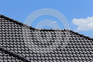 Black tiles roof on a new house